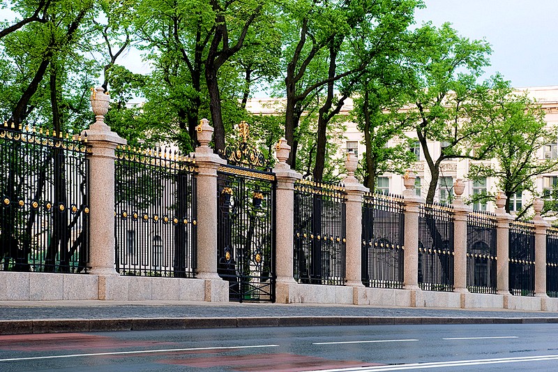 The famous wrought-iron fence of the Summer Garden and the Summer Palace of Peter the Great in Saint-Petersburg, Russia The famous wrought-iron fence of the Summer Garden and the Summer Palace of Peter the Great in Saint-Petersburg, Russia